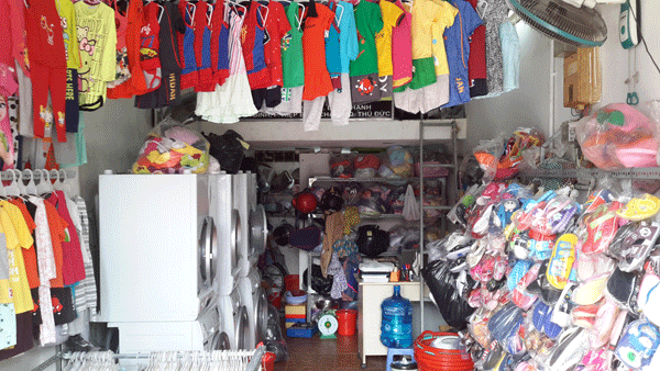 Sang shop thời trang trẻ em kết hợp giặt ủi tự động